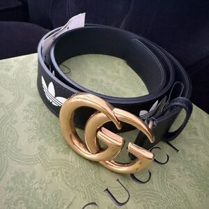 Brand new Gucci Black and Gold unisex Belt with dustbag and box
